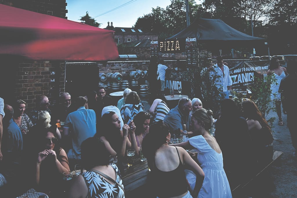 Pizzamici pop-up stall at a local brewery with customers